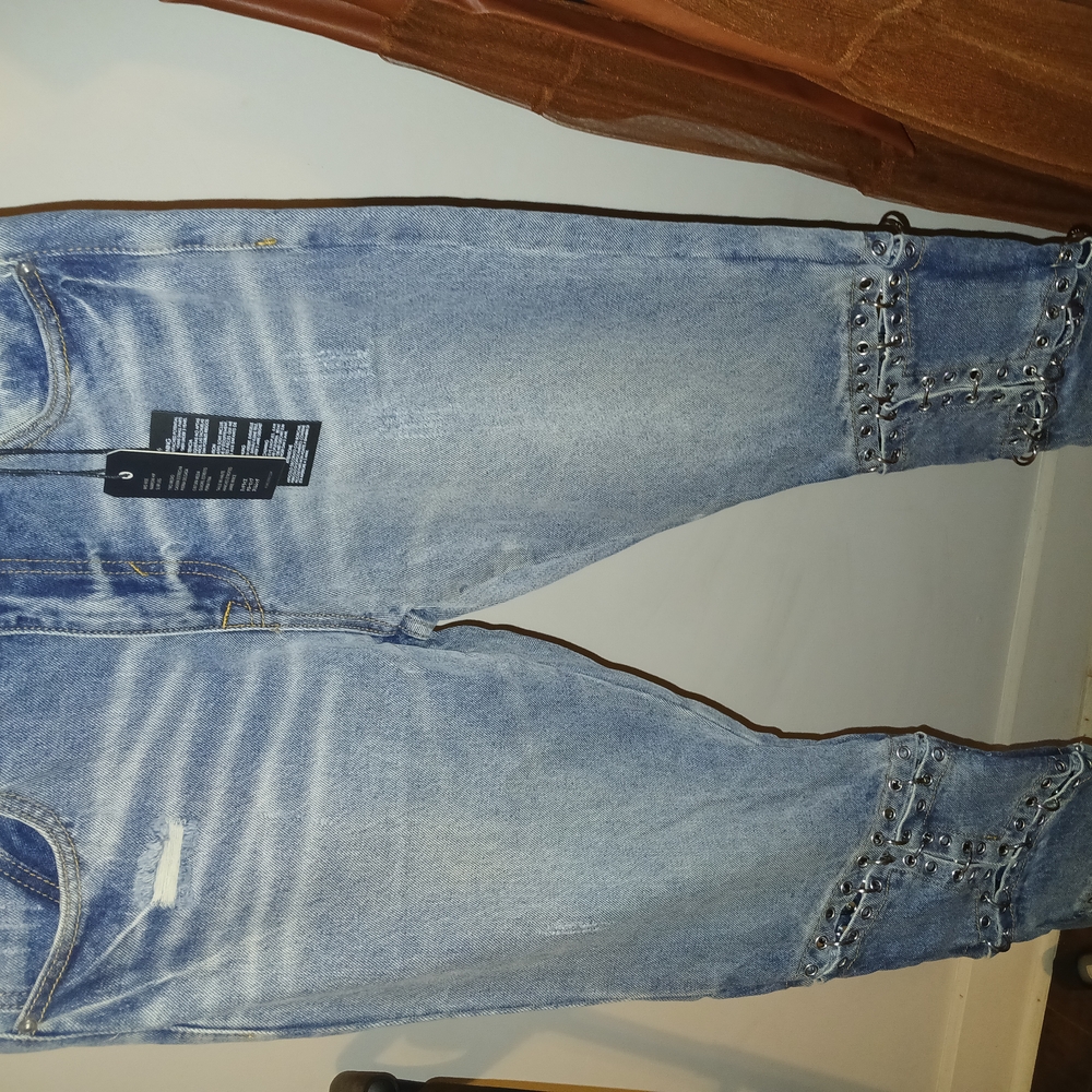 Stylish Blue Distressed Jeans with Studded Details